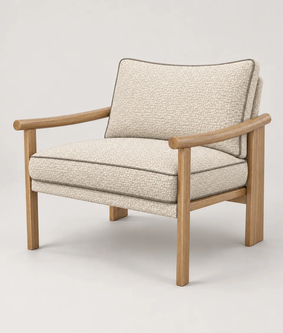 Mangeshi Arm Chair in cream weave, taupe piping with a natural oak frame, front three-quarter view on a neutral studio background