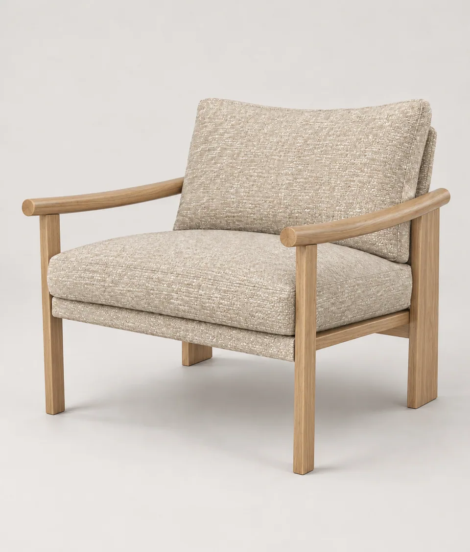 Mangeshi Arm Chair in sand bouclé with a natural oak frame, front three-quarter view on a neutral studio background