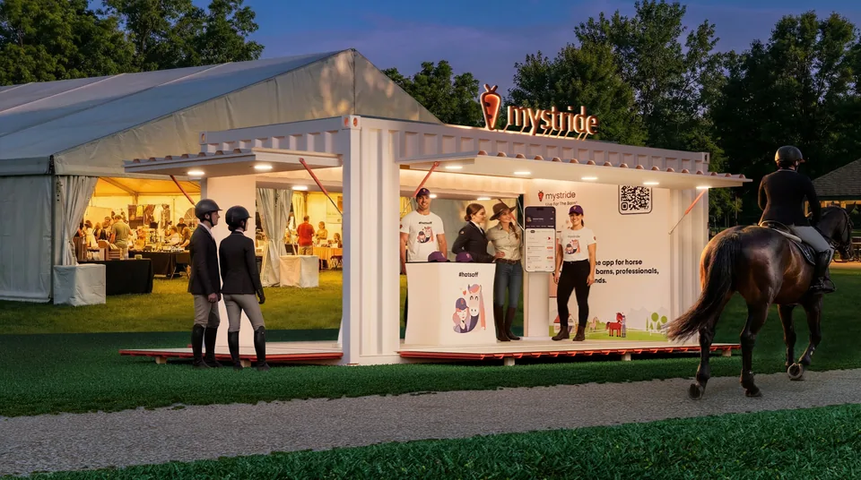 Dusk 3D render of the MyStride shipping-container booth with its interior lights and rooftop sign lit